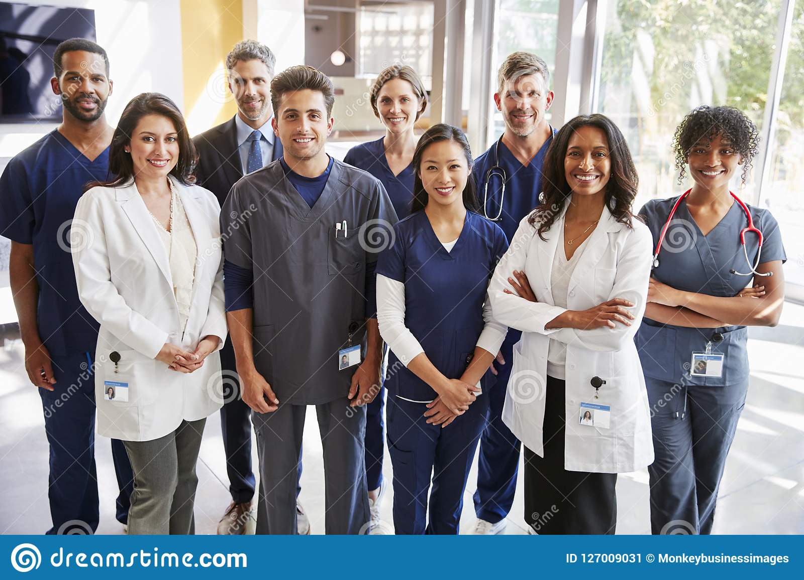 team-healthcare-workers-hospital-smiling-to-camera-team-healthcare